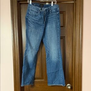 White House Black Market Flare Jeans in Blue